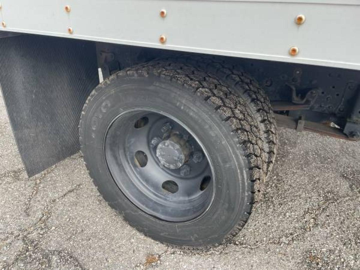 1999 white /gray Isuzu NPR (4KLC4B1R8XJ) with an 5.7 GAS V8 engine, Auto transmission, located at 5700 Curlew Drive, Norfolk, VA, 23502, (757) 455-6330, 36.841885, -76.209412 - -1999 Isuzu NPR 61k -Ready to work! -V8 gas motor -6 like new tires with great tread -12 ft box with roll up door -Tommy gate has been removed -No issues, runs and drives great -New state inspection -VADLR $250 processing fee. No other dealer fees. - Photo#14